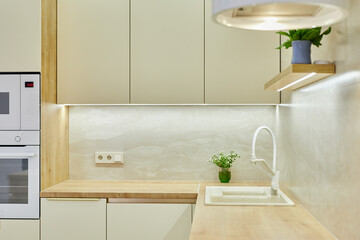 Minimalistic kitchen background with wooden countertop, providing a clean surface for the...