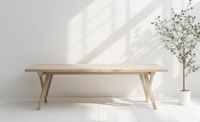 Light-filled room with simple wooden table (2)