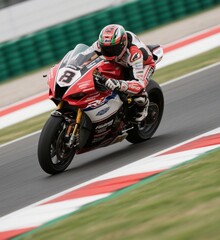 Superbike racing at high speed on track