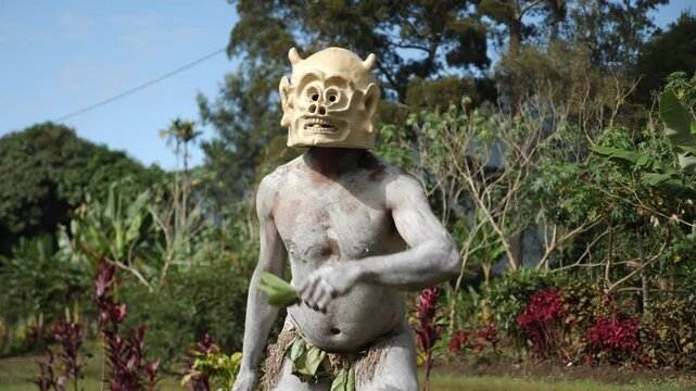 Asaro Mudmen tribe bow hunting. Papuan tribe dance. Mount Hagen tribe festival. Cultural event. Indigenous men in native costumes. High quality 4k footage