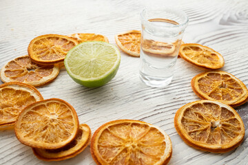 lime lemon and shot drink in close up