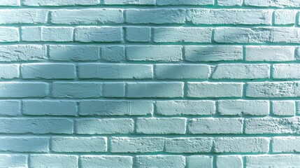 Obraz premium Wall made of white bricks with a blue tint. The wall is in the shade and the sun is casting a shadow on it