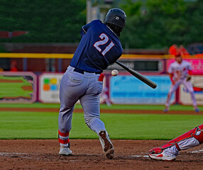 #21 baseball player hitting