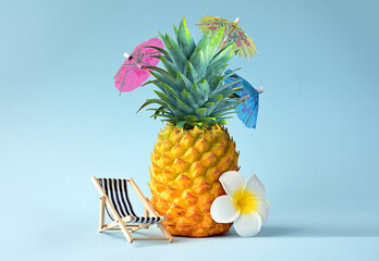 White flower, chair and pineapple. Summer pool float party idea. Summer concept.