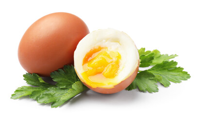 Soft boiled eggs and parsley on white background