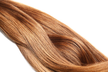 Fototapeta premium Locks of healthy shiny hair on white background