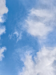 White clouds drifting across a vibrant blue sky in prague copy space wallpaper