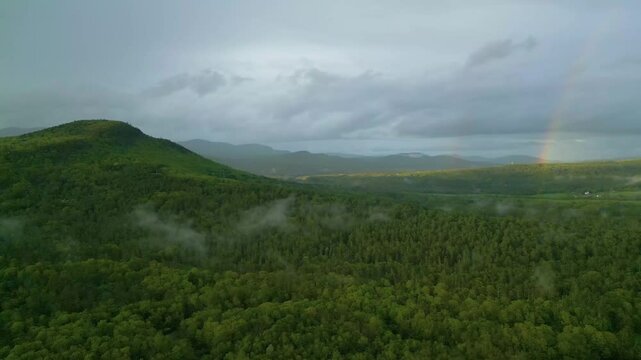 Lush Mountain Landscape Under Stormy Sky in Maine, drone 4K