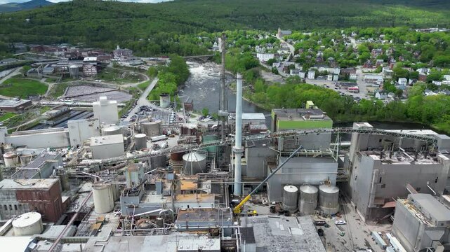 Aerial View of Industrial Paper Mill and Wood Processing Plant in Maine, drone 4k