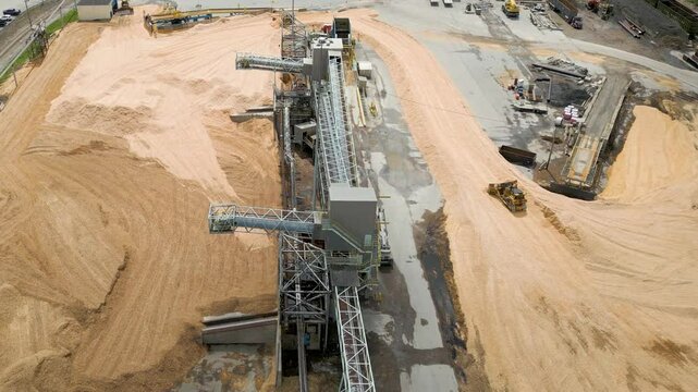 Aerial View of Industrial Paper Mill and Wood Processing Plant in Maine, drone 4K