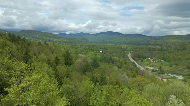 Lush Mountain Landscape Under Stormy Sky in Maine, drone 4K