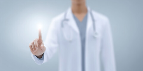 Medical professional interacting with digital interface, healthcare technology concept, doctor using touch screen for patient data management and innovative solutions