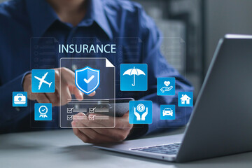 Insurance and assurance concept, Businessman using laptop with insurance icons for medical, life, car, home, travel insurance.