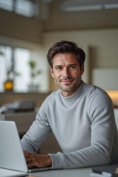 man working on laptop computer