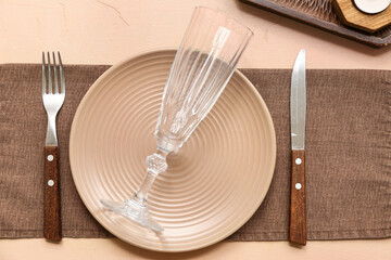 Beautiful table setting on beige background