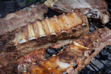Juicy Grilled Ribs Smoking on a Barbecue Grill