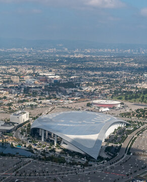 Inglewood, Los Angeles, California, USA - September 18, 2023 - Aerial view of  SoFi Stadium home of the LA Rams and the LA Chargers with the Kia Forum visible in the background