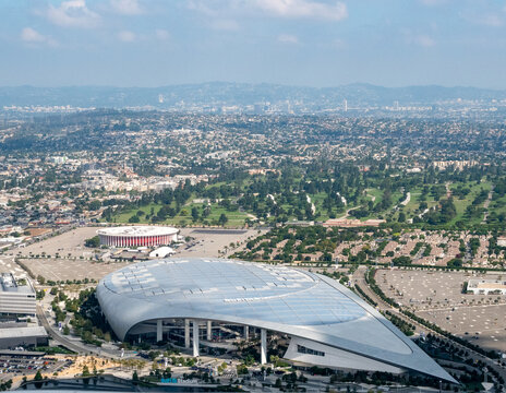 Inglewood, Los Angeles, California, USA - September 18, 2023 - Aerial view of  SoFi Stadium home of the LA Rams and the LA Chargers with the Kia Forum visible in the background
