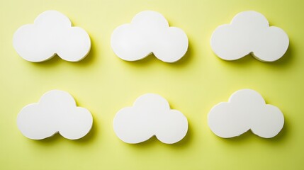 Six White Clouds on Yellow Background Minimalist Design
