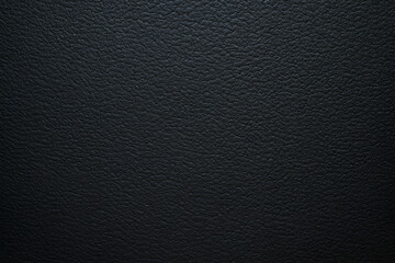 A close-up of a textured black surface that adds depth and dimension to design projects. Ideal for backgrounds, overlays, and creating contrast in digital art or print media.