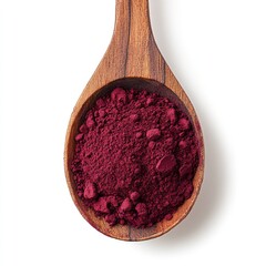 Deep crimson powder in wooden spoon (5)