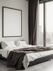 Photo of a large blank poster frame on the wall in an all-white bedroom with concrete floors and black furniture.