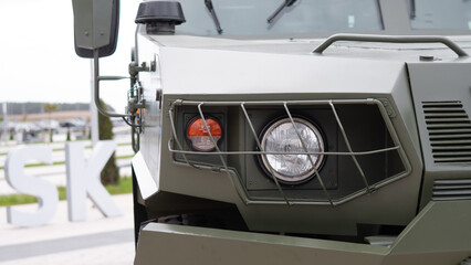 Military Vehicle Displayed in a Modern Exhibition Showcasing Advanced Weaponry and Technology Used in Contemporary Conflicts
