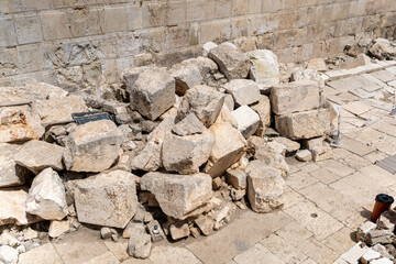 Pile of massive Herodian stones, remnants from the destruction of the Second Temple in 70 CE, Jerusalem Archaeological Park.
