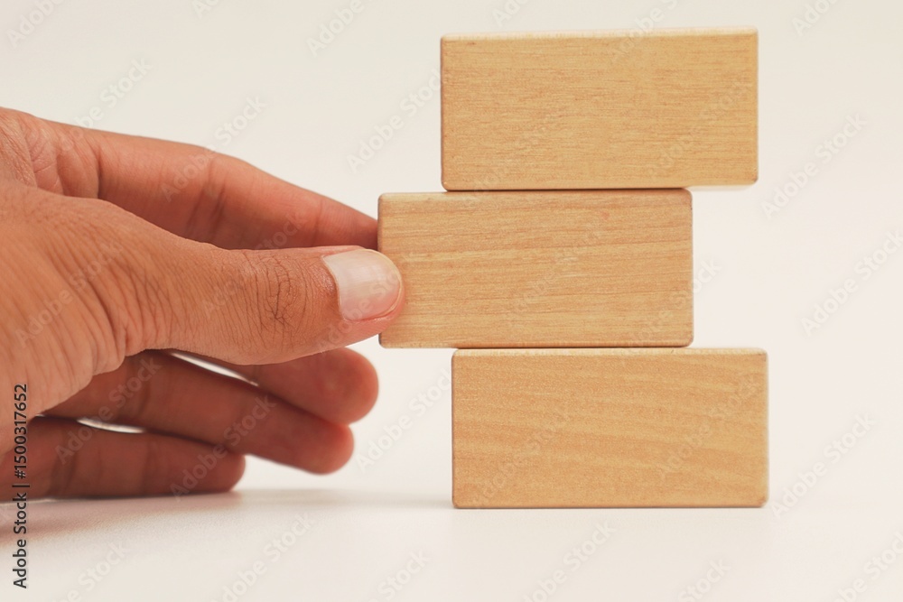 Fototapete stack of empty wooden blocks for written text isolated background