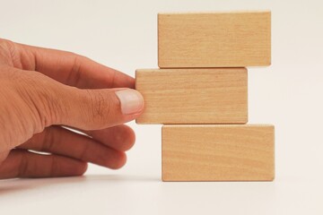 Stack of empty wooden blocks for written text isolated background