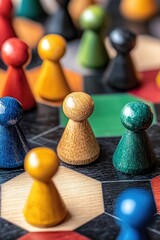 Close-up view of colorful game pieces on a hexagonal board