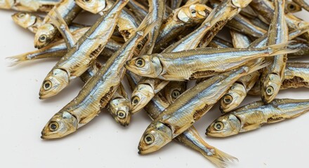 Photo of a Pile of Dried Fish on a White Background