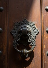 Close Up Of Ornate Metal Door Handle On Aged Wooden Door Photo