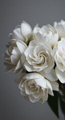 Close-up Photo of a White Gardenia Bouquet Showing Delicate Petals and Green Leaves