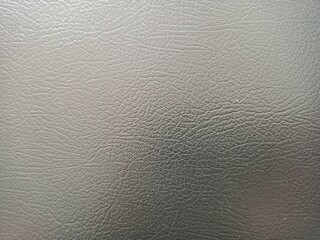 Dark Gray Textured Surface Resembling Pebbled Leather or Plastic