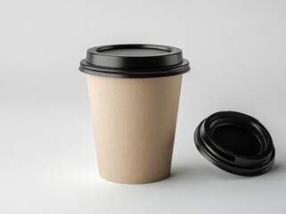 White paper coffee cup with black lid and brown sleeve