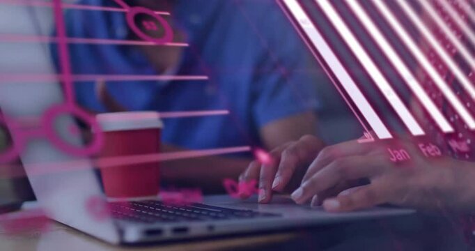 Woman typing data commands into laptop initiating animated bar and pie charts for business analysis