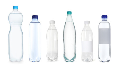 Fototapeta premium Plastic bottles with water on white background, set