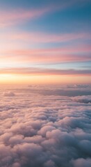 Photo of a Pink and Orange Sunrise Sky Above Cloudscape