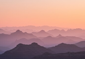 Fototapeta premium Photo Mountain Range At Sunset With Orange And Pink Hues And Gradients