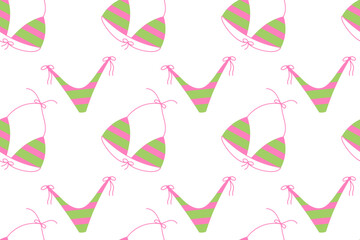 Seamless pattern with striped green and pink bikinis on a transparent background. Fun and trendy summer swimwear design for digital products, textiles or prints.

