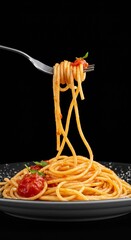 Close Up Photo Of Spaghetti With Tomato Sauce On Fork Against Black