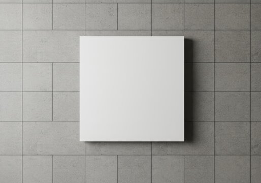 Photo of a White Square Floating on a Textured Gray Concrete Background