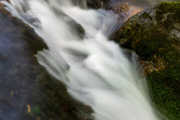 flowing stream in the mountain valley