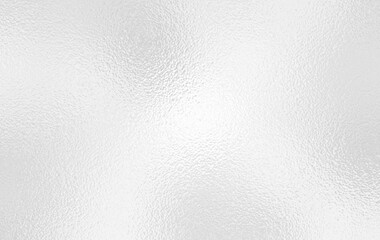 Silver foil background or gray foil glass texture background. Abstract gradient bright light reflection and shiny rough texture surface