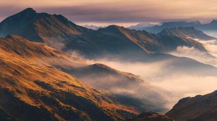 Majestic mountain peaks at sunrise, golden light through misty valleys -- A serene wilderness awakening