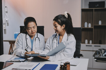doctors and nurse having informal meeting in hospital canteen