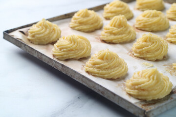 a loaf unbaked cream puff choux ready to bake
