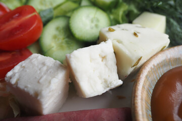Delicious fresh salad ingredients displayed on a plate