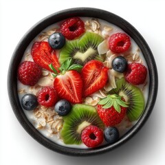 Obraz premium Fresh mixed berry fruit salad with slices of strawberries, raspberries, blueberries, kiwi, and coconut flakes on a black bowl for healthy breakfast or snack